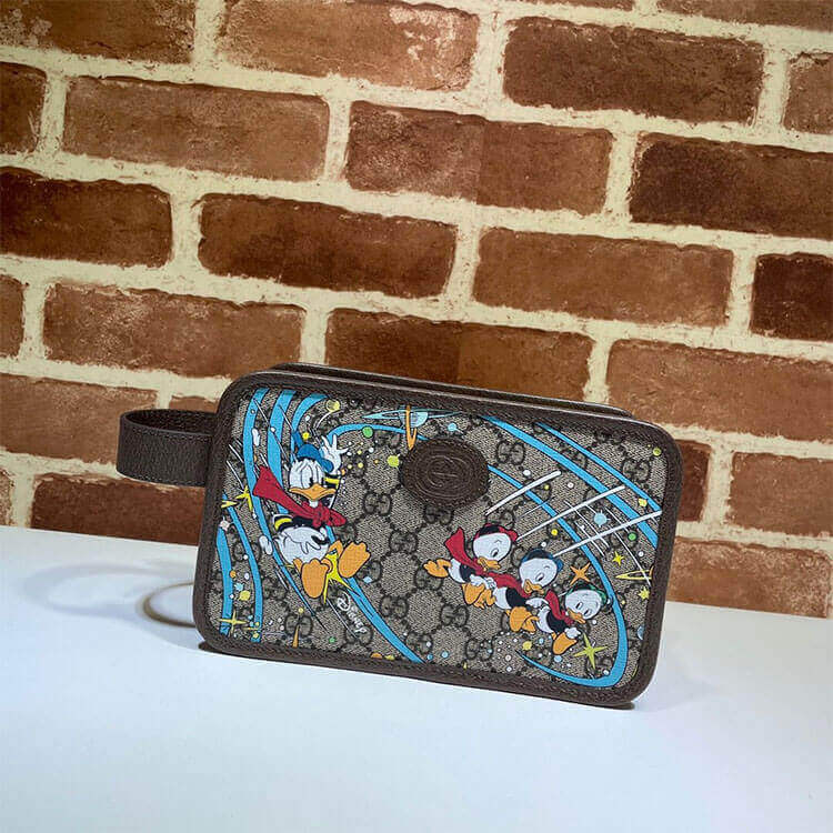 disney x G*u*i donald duck cosmetic case