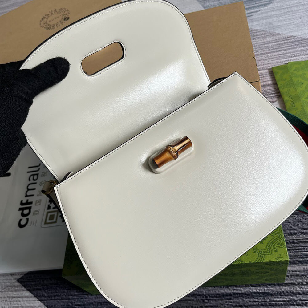 G*u*i bamboo 1947 medium top handle bag