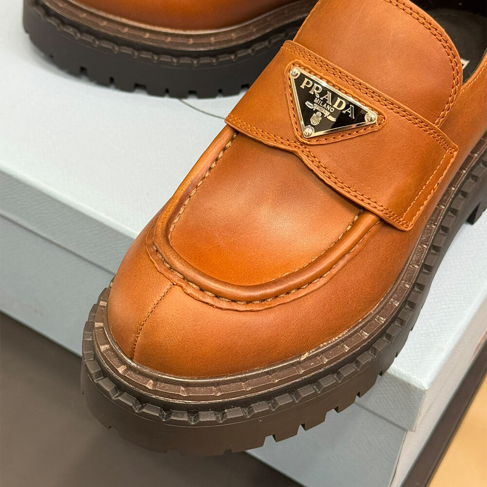 Pra*a double chocolate leather loafers