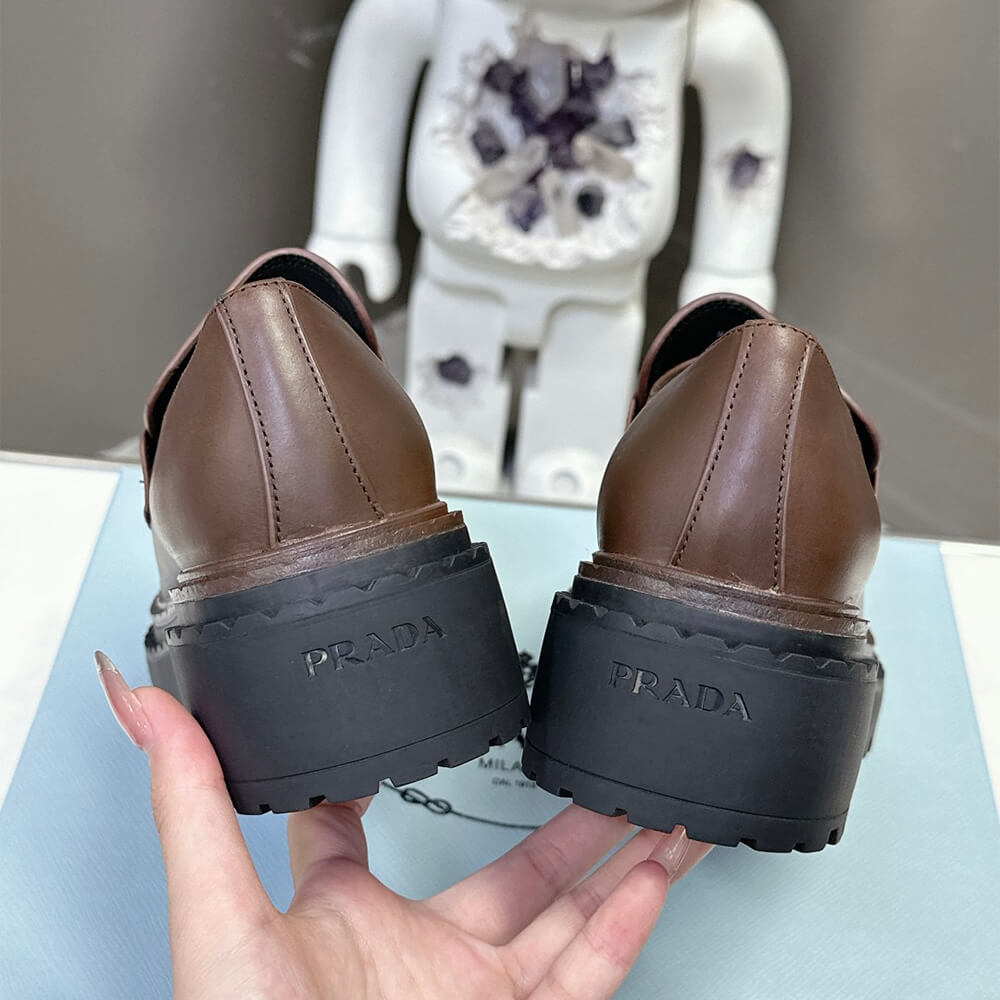 Pra*a double chocolate leather loafers