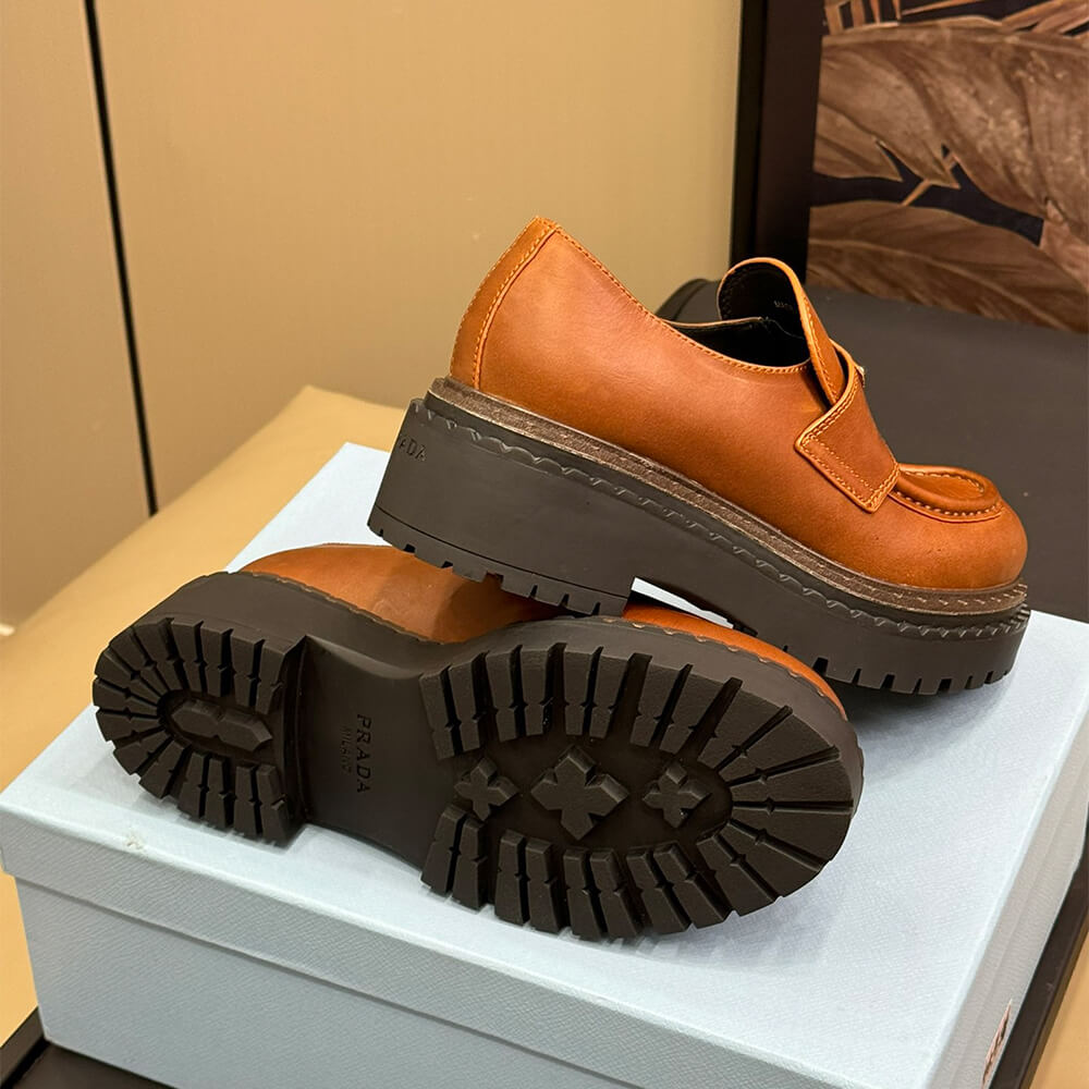 Pra*a double chocolate leather loafers
